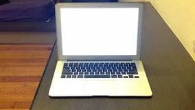 2009 white macbook side view
