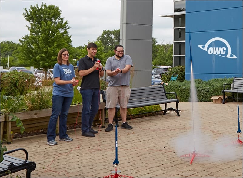 Larry O'Connor and Jen Soule launch model rockets at OWC headquarters in Woodstock, Illinois