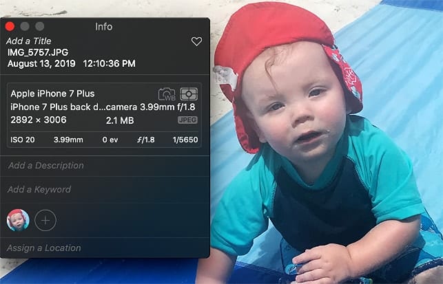 Photo of baby in Photos with geotag information dialog box