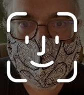 Face ID logo over face mask