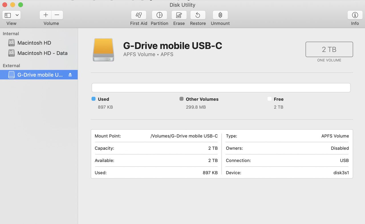Disk Utility, showing a 2TB mobile USB-C hard disk formatted with Apple File System (APFS)