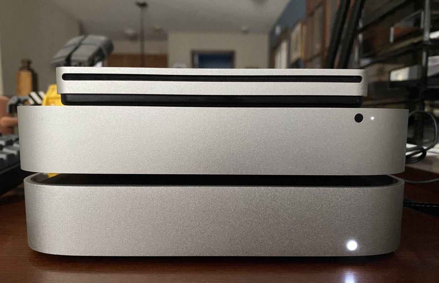 The Media Server. From top, an Apple SuperDrive, the 2014 Mac mini, and an 8TB OWC miniStack drive