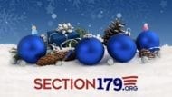 section 179.org on snow with blue ornaments