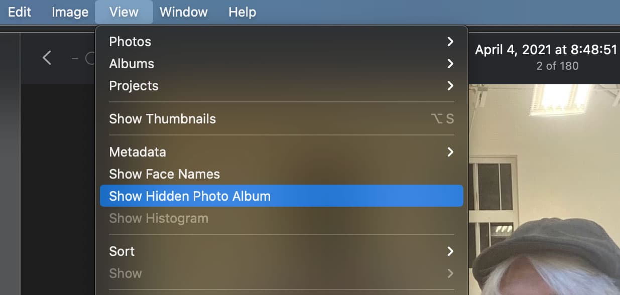 Show hidden photo album in macOS Photos app