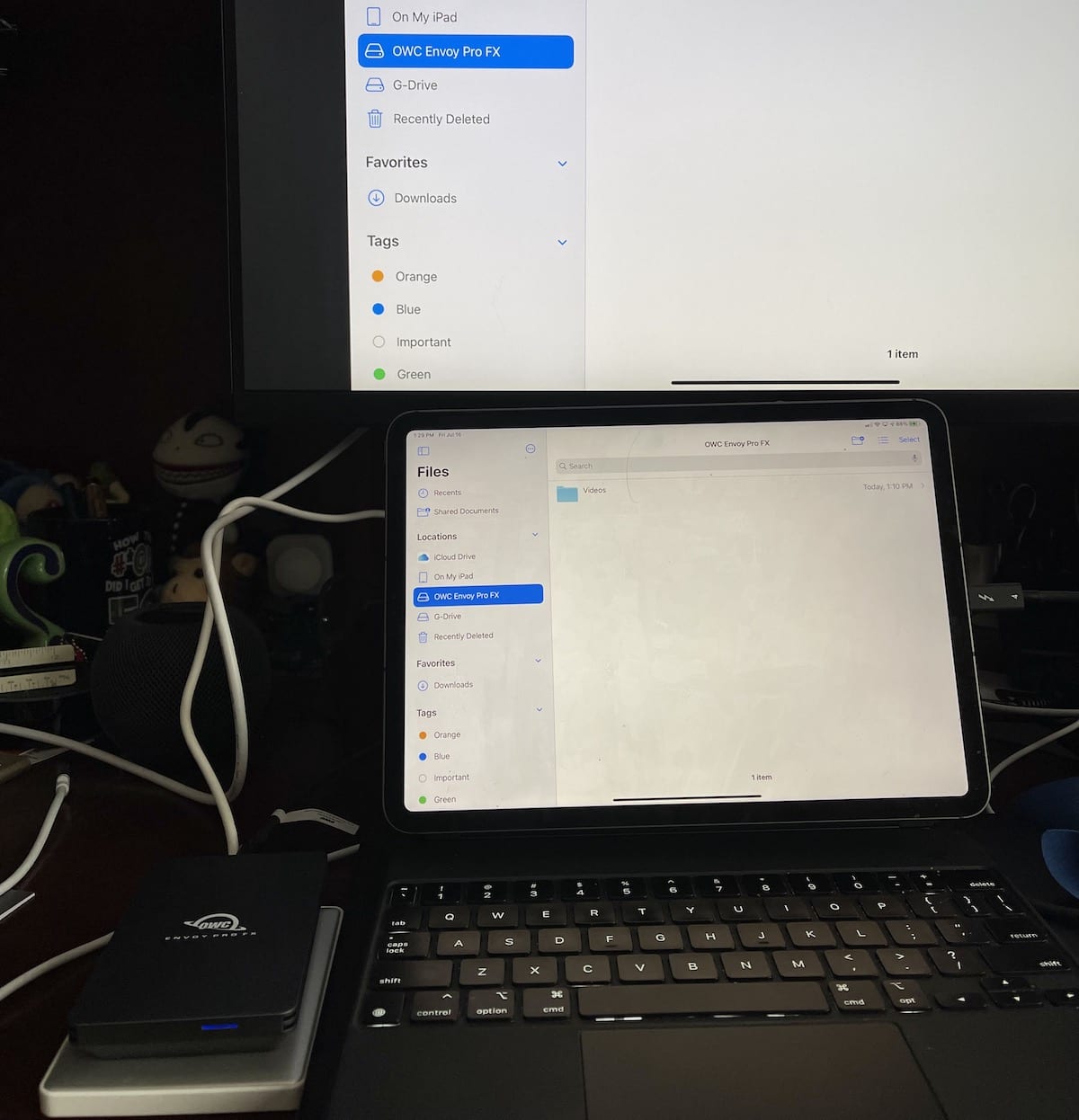 11-inch iPad Pro driving a 27-inch monitor, OWC Envoy Pro FX and a third-party USB-C drive
