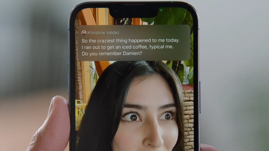 Live captions appear on an iPhone during a Facetime call.